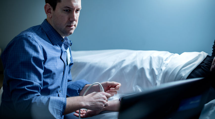 Dr. Alpers doing a procedure